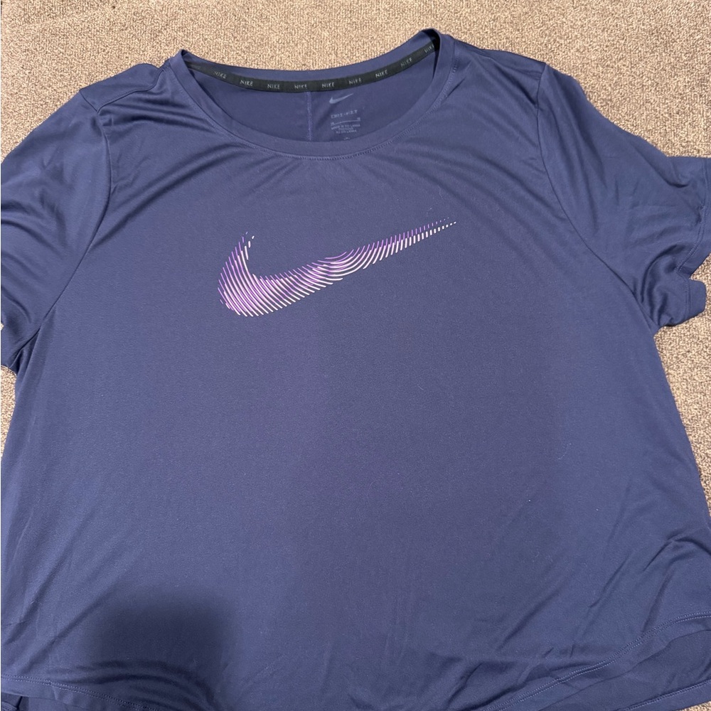 Nike Women's Short Sleeve Dri-FIT Tee in Navy with Purple Swoosh